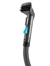 Polster- & Teppichreiniger Kompakt - Grau/Blau mit Bürstendüse und flexiblem Schlauch für gründliche Fleckenentfernung auf Polstern und Teppichen.