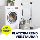 Ein Wäschebereich mit einer Waschmaschine, einer Anlage und dem EASYmaxx Falt-Wäscheständer 1800 (18m Trockenlänge), der platzsparend vertikal verstaut wird. Auch für kleine Wohnungen geeignet und klappbare Kleiderstange.