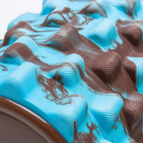 #DoYourFitness Faszienrolle Ishana Graffiti in Braun/Blau mit strukturierter Oberfläche zur myofaszialen Massage und Tiefenmuskulaturstärkung.