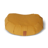 #DoYourYoga Yoga-Kissen Ganesh in Indischgelb, Halbmondform, 45x30x14 cm, gefüllt mit Bio-Buchweizenschalen für Meditation und Yoga.