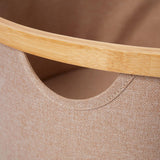 Nahaufnahme der LUMALAND Bambus-Rahmen Aufbewahrungsbox rund - 3er-Set in Taupe mit stabilem Bambusrahmen und Stoffbezug.