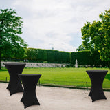 LUMALAND Stehtischhusse - Tisch Bezug - Husse - Ø 70-75 cm - Schwarz - 5er-Set auf Outdoor-Stehtischen im Park platziert