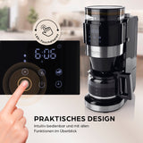 Barista Filterkaffeemaschine Grind mit Mahlwerk, LED-Touchdisplay & Timer, schwarzes Design mit digitalem Bedienfeld.