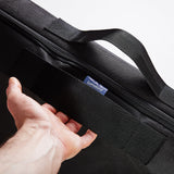 LUMALAND Matratzen-Aufbewahrungstasche schwarz mit robustem Tragegriff und dreiseitigem Reißverschluss, 160 x 200 x 25 cm, platzsparend.