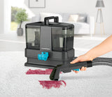 Polster- & Teppichreiniger Kompakt - Grau/Blau reinigt gründlich Flecken auf Teppich und Polstern mit integriertem Sprüh-, Bürst- und Saugsystem.