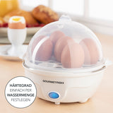 GOURMETmaxx Eierkocher für 7 Eier, weiß, mit transparente Deckel, beleuchtetem Schalter und herausnehmbarem Eierhalter.
