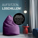 LUMALAND Luxury XL Sitzsack stylischer Beanbag in Lila mit 120L Füllung, ideal zum Entspannen und Chillen im modernen Wohnraum.