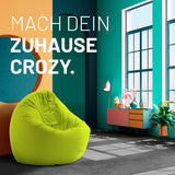 LUMALAND Sitzsack Drops (300 L) Apfelgrün in modernem Raum im Innenbereich, bequem und vielseitig für drinnen und draußen.