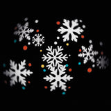 EASYmaxx LED-Projektor Kerze mit rotierenden Schneeflocken-Motiven und 4 wechselbaren Themenschablonen, kabellos und cremefarben.