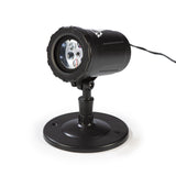 W:O:A LED-Motivstrahler mit Logo, schwarzer Projektor mit Sockel und Kabel für rotierende Skull-Projektionen innen und außen.