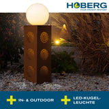 Hoberg LED-Dekosäule "Mandala" in Rost-Optik mit LED-Kugel, 3 Lichtmodi, solar- und USB-betriebbar, für Innen- und Außenbereiche.