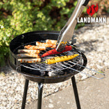 LANDMANN Holzkohle-Rundgrill mit verchromtem, höhenverstellbarem Rost, ideal für mobiles Grillen von Würstchen und Gemüse im Freien.