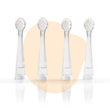 Vier durchsichtige Zahnbürstenköpfe stehen aufrecht in einer Reihe auf einem weißen Hintergrund, dahinter befindet sich eine beige Form.