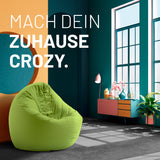 LUMALAND Sitzsack Drops (300 L) grün im modernen Wohnraum, bequem und vielseitig für Innen- und Außenbereiche geeignet.