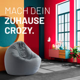 LUMALAND Sitzsack Drops (300 L) grau in modernem Wohnzimmer, bequem, drinnen & draußen nutzbar, pflegeleicht und langlebig.