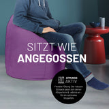 LUMALAND Luxury XL Sitzsack stylischer Beanbag lila mit 120L Füllung für komfortables Sitzen und modernen Wohnstil.
