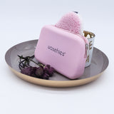 waschies Travel Bag rosa aus weichem Silikon, handlich, platzsparend und nachhaltig für die Aufbewahrung von waschies® unterwegs.