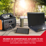EASYmaxx Powerstation tragbar - 1506 Wh - schwarz/orange lädt Laptop und Tablet unterwegs mit verschiedenen Anschlüssen und LED-Lichtmodi.