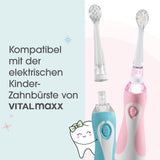 Zwei elektrische Kinderzahnbürsten und Bürstenköpfe von Vitalmaxx, mit deutschem Text und einem lächelnden Zahn-Cartoon.
