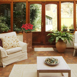 PRIMA GARDEN LED-Dekosäule mit Pflanzschale in Rost-Optik braun mit warmweißer LED-Beleuchtung im wintergarten.