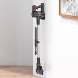 MAXXMEE Akku-Zyklon-Staubsauger mit 3-fach-Filter, Verlängerungsrohr bis 80 cm, anthrazit/pink, kabellos an Wandhalterung befestigt.