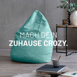 LUMALAND Luxury XL Sitzsack stylischer Beanbag Türkis mit 120L Füllung, ideal zum Entspannen im modernen Wohnraum.