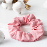 fairtye Scrunchie - rosa aus Bio-Baumwolle, elastisch und dehnbar, metallfrei für starken Halt und vielseitige Frisuren.