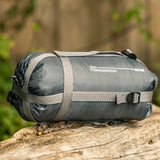 Where Tomorrow Camping Schlafsack Small & Light Mumienschlafsack wasserabweisend mit Packtasche in Goblinblau kompakt gerollt