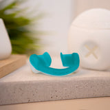 bruXane 2go - Zahnschiene mit Biofeedback in türkis gegen Zähneknirschen für entspannteren Schlaf und reduzierte Knirschaktivität.