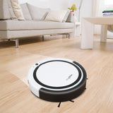 MAXXMEE Saugroboter - Bis zu 60 Minuten Einsatzzeit - weiß/schwarz reinigt leise Hartböden mit Saug- und Wischfunktion im modernen Wohnzimmer.