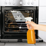 Hand hält EASYmaxx Orangenreiniger 3tlg. zum Entfernen von hartnäckigem Schmutz im Backofen, zeigt Reinigungswirkung.