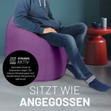 LUMALAND Luxury XL PLUS Sitzsack lila mit 220L Füllung, robusten Nähten und ergonomischem Design für optimale Sitzposition.